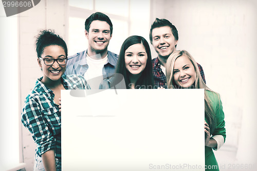 Image of group of students at school with blank board