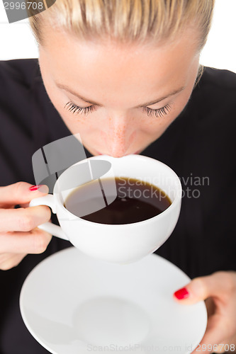 Image of Business woman with cup of coffee.