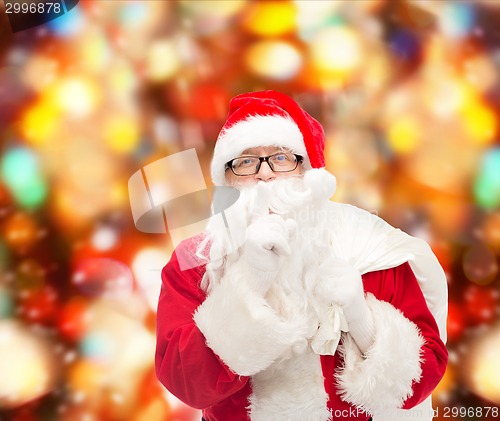 Image of man in costume of santa claus with bag