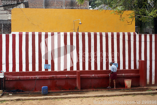 Image of Man near water tap