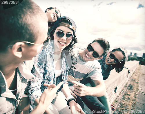 Image of group of teenagers hanging out