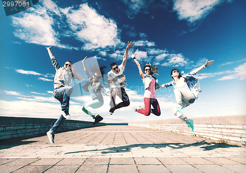 Image of group of teenagers jumping