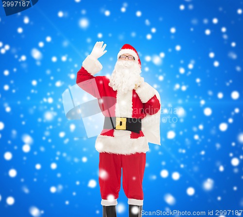 Image of man in costume of santa claus with bag