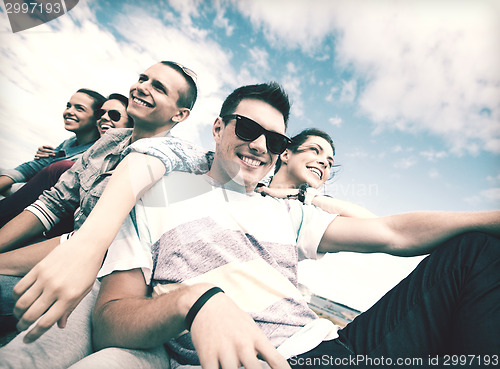 Image of group of teenagers hanging out