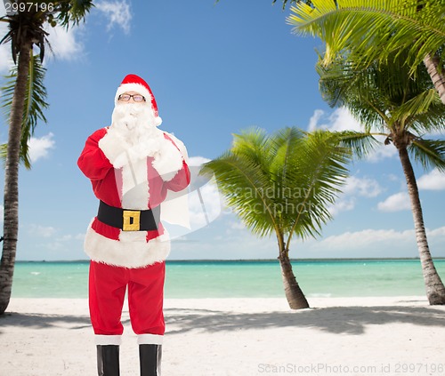 Image of man in costume of santa claus with bag