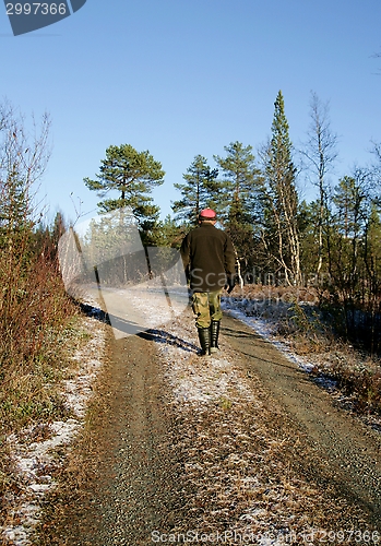 Image of Man on a dirt road