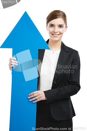 Image of Business woman holding a blue arrow