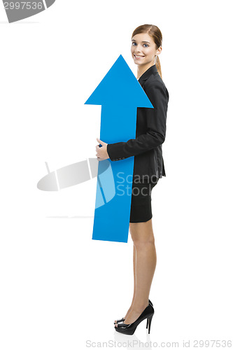 Image of Business woman holding a blue arrow