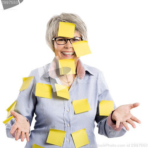 Image of Elderly woman with yellow notes