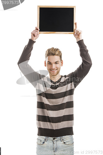 Image of Man holding a chalkboard