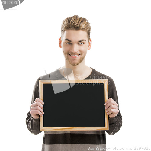 Image of Man holding a chalkboard
