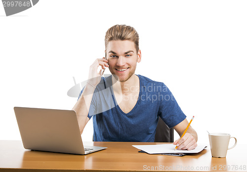 Image of Young man and talking at phone