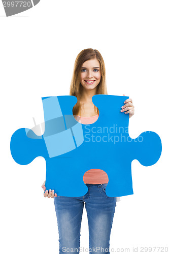 Image of Woman holding a puzzle