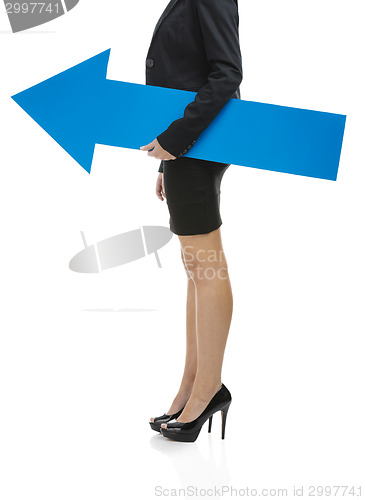 Image of Business woman holding a blue arrow