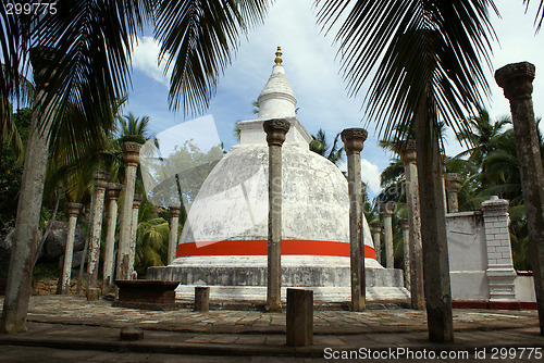 Image of White stupa in forest