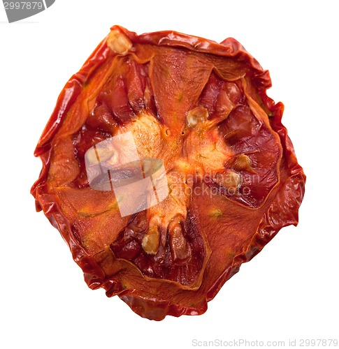 Image of Dried slice of tomato. Isolated on white background. 