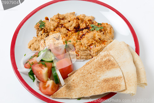 Image of Bread, salad and circassian chicken high angle