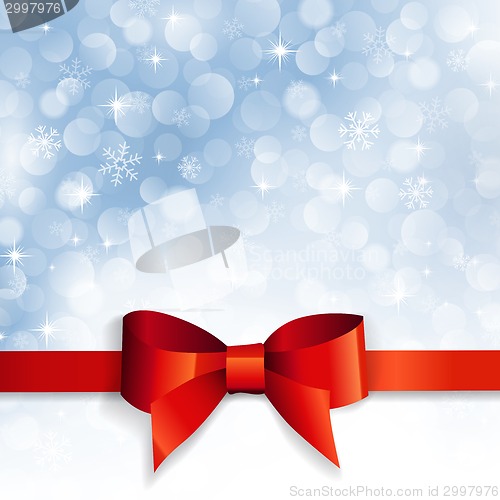 Image of red bow on a background snowflakes