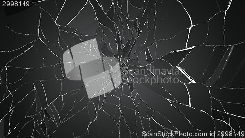 Image of Many pieces of broken glass on white