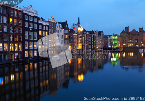 Image of Buildings on canal in Amsterdam, Netherlands