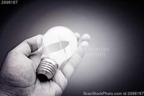 Image of Background with lit lightbulb