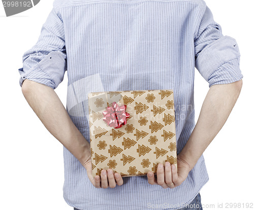 Image of Young man holding a present