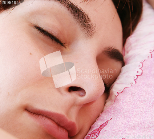 Image of Beautiful young woman sleeping.