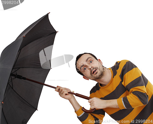 Image of Man with umbrella