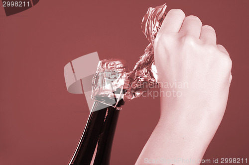 Image of Opening champagne bottle