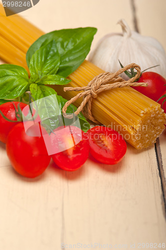 Image of Italian spaghetti pasta tomato and basil