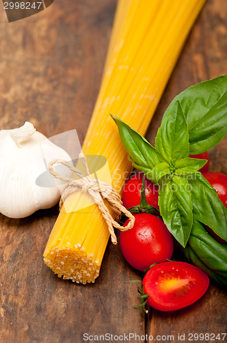 Image of Italian spaghetti pasta tomato and basil