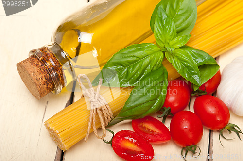 Image of Italian spaghetti pasta tomato and basil