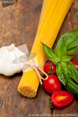 Image of Italian spaghetti pasta tomato and basil