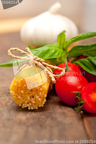 Image of Italian spaghetti pasta tomato and basil