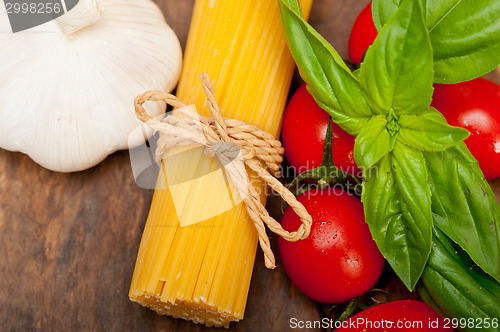 Image of Italian spaghetti pasta tomato and basil