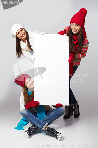 Image of Winter women billboard sign.