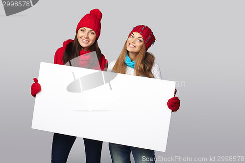 Image of Winter women billboard sign.