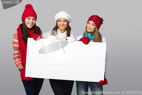 Image of Winter women billboard sign.