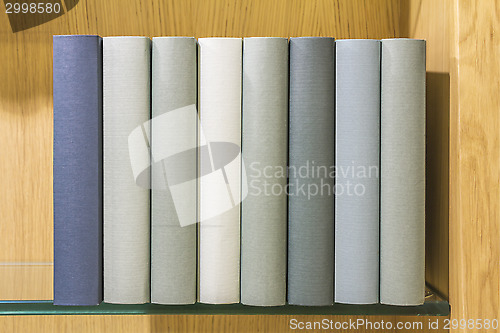 Image of Books on glass shelf