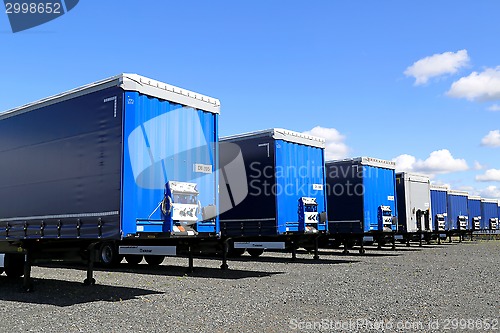 Image of Row of Trailers on a Yard