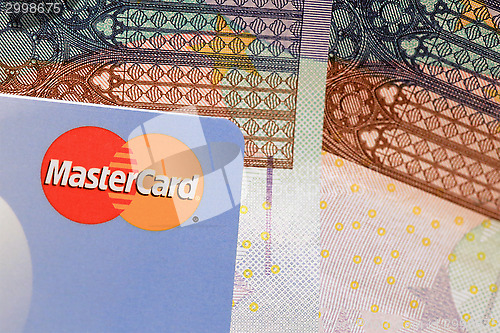 Image of Mastercard Credit Card Sign Close Up with Euro Caash