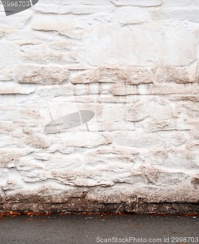 Image of stucco white wall in autumn