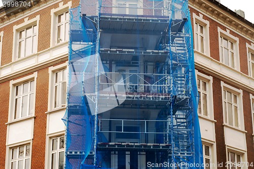 Image of restoration facade of old house