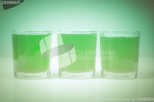 Image of Retro look Green apple juice