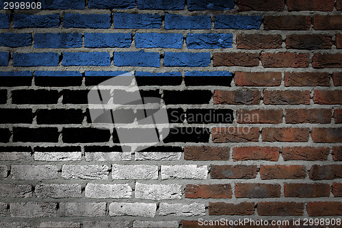 Image of Brick wall texture with flag