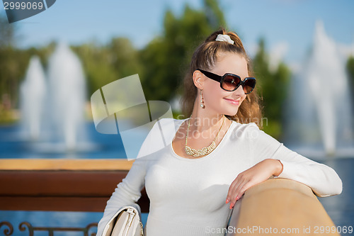 Image of Portrait of cheerful young woman