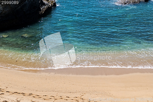 Image of Wave of the Sea on the Sand Beach