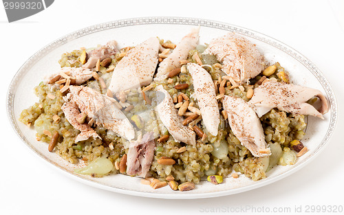 Image of Cinnamon dusted chicken with frikeh and nuts