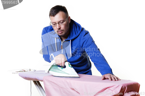 Image of Man doing housework