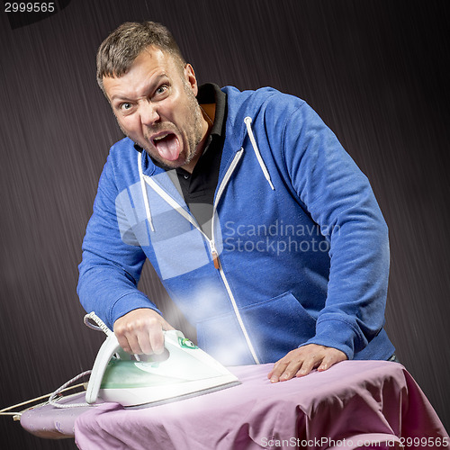 Image of Man doing housework